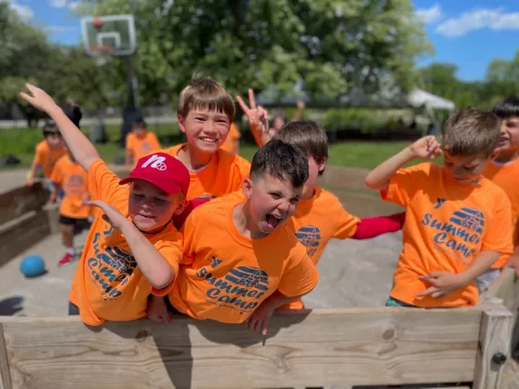 Summer camp picture of children smiling outside