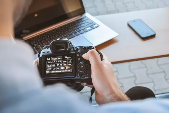 Person holding a camera